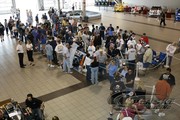Fans line up for autographs at the Penske Racing Fan Fest